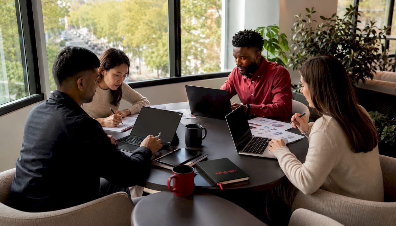Marketing operations team collaborating in office