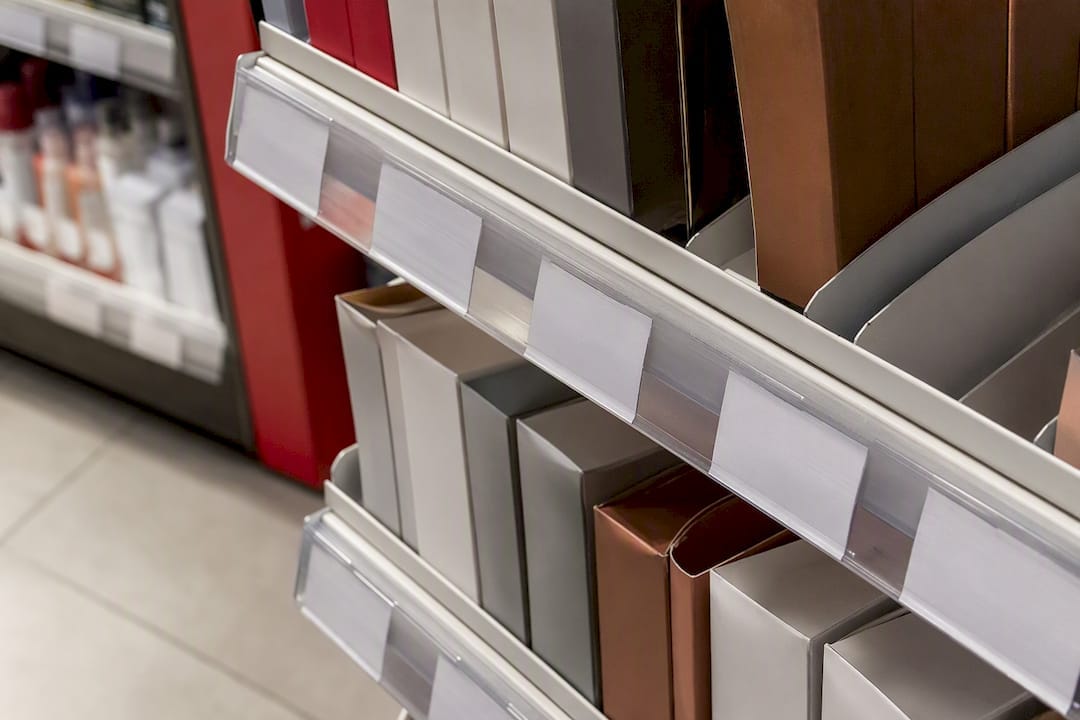 Close-up retail shelf showing crowded products