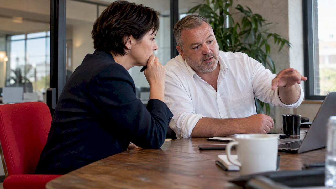 Agency and client leaders discussing partnership options