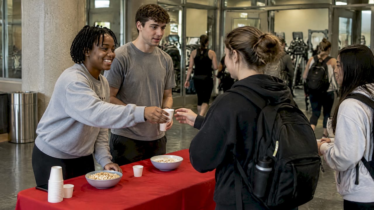 Student ambassadors offering samples on campus